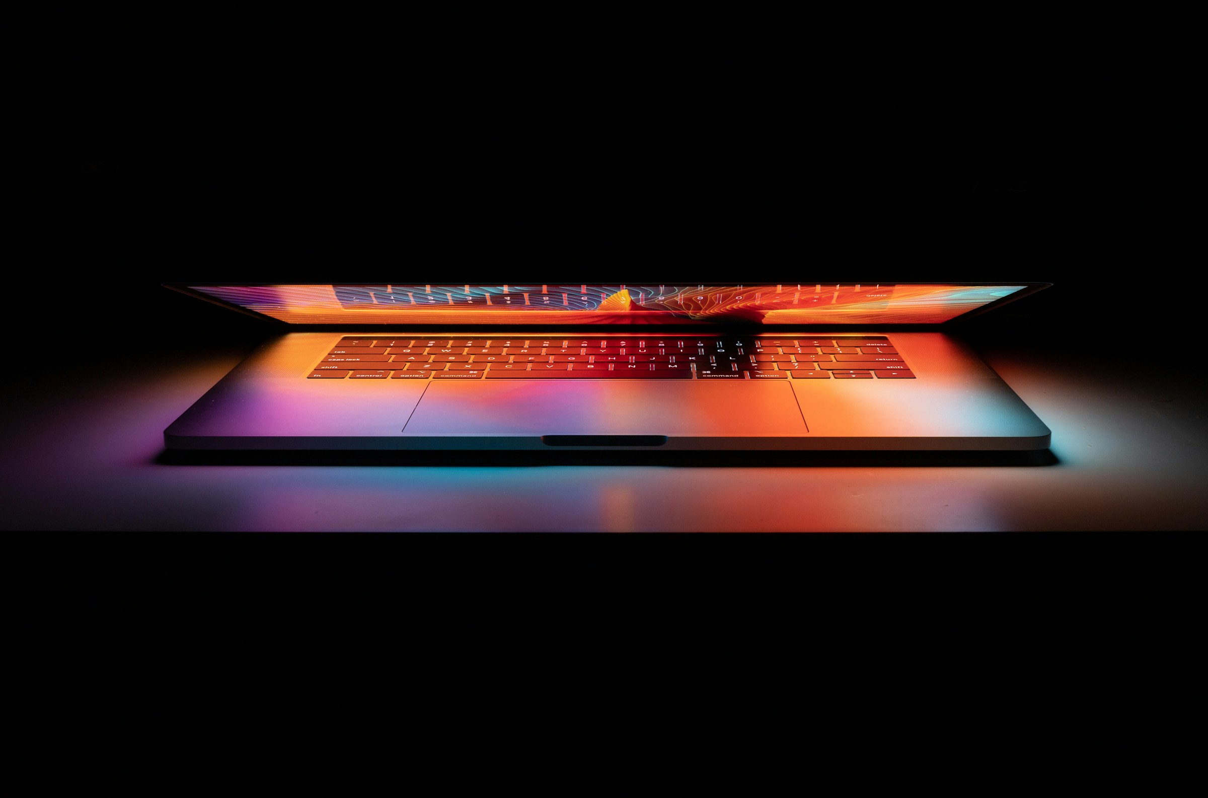 Laptop with fluorescent colours on the screen
